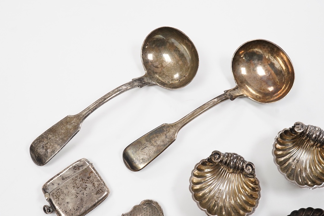 Small silver including a pair of Victorian provincial fiddle pattern sauce ladles, Robert Williams & Sons, Exeter, 1845, 16.6cm, a Victorian card case by Hilliard & Thomasson, two vesta cases, a sovereign case, a 1970's